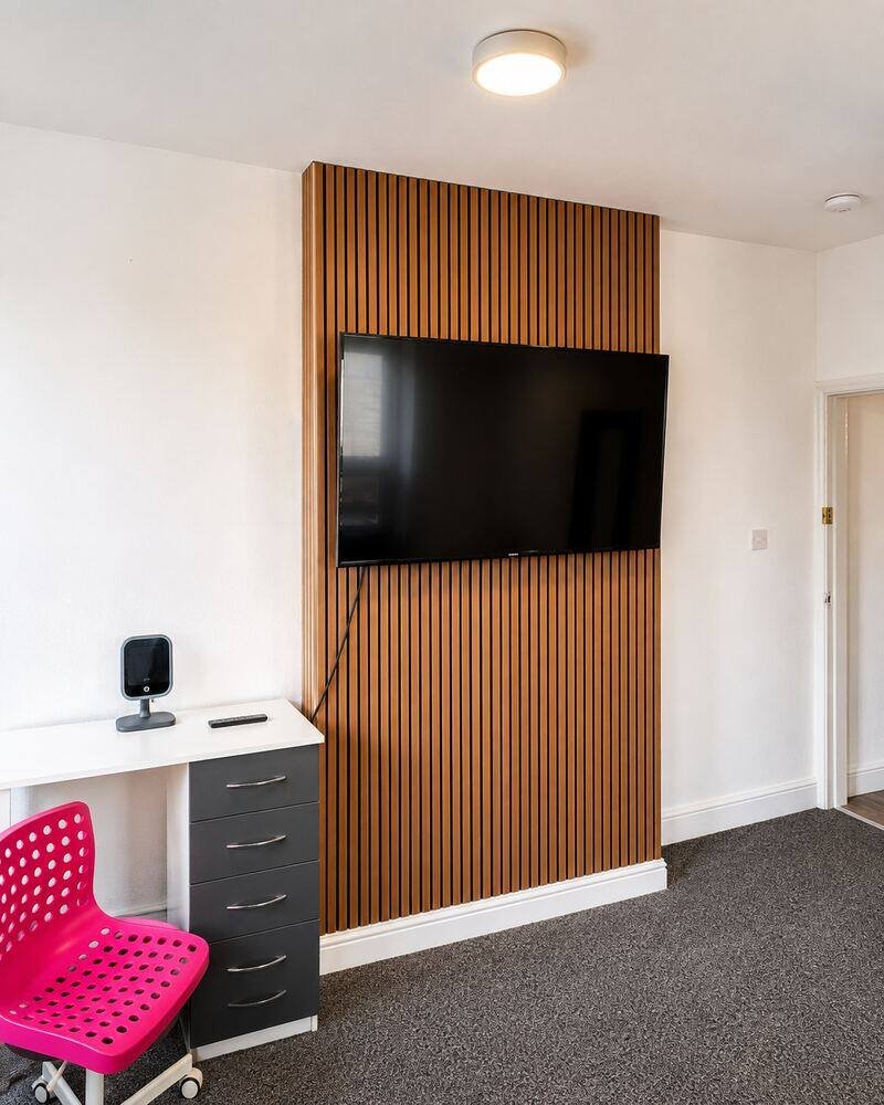 The Nottingham Hideaway bedroom with TV and workspace